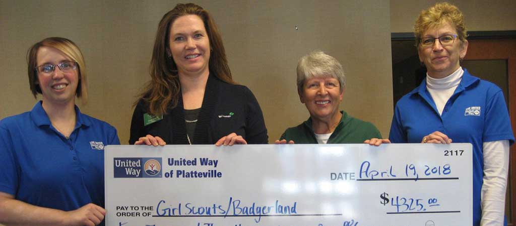 Photo of United Way presenting check to Girl Scouts of Badgerland